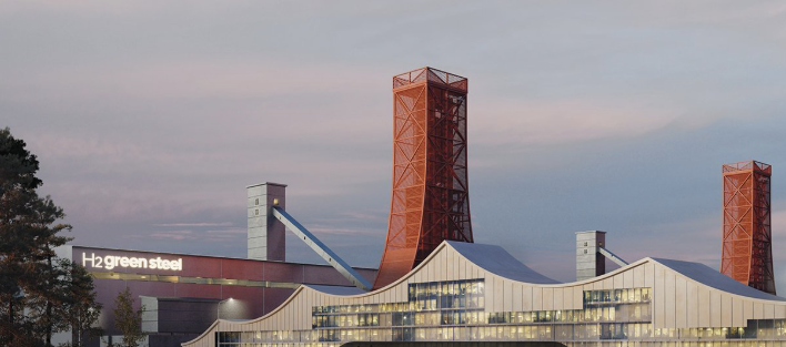 Industrial facility with large steel structures and a building labeled H2 Green Steel.